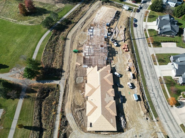 Roof being placed on the new courtyard at fitchburg memory care community