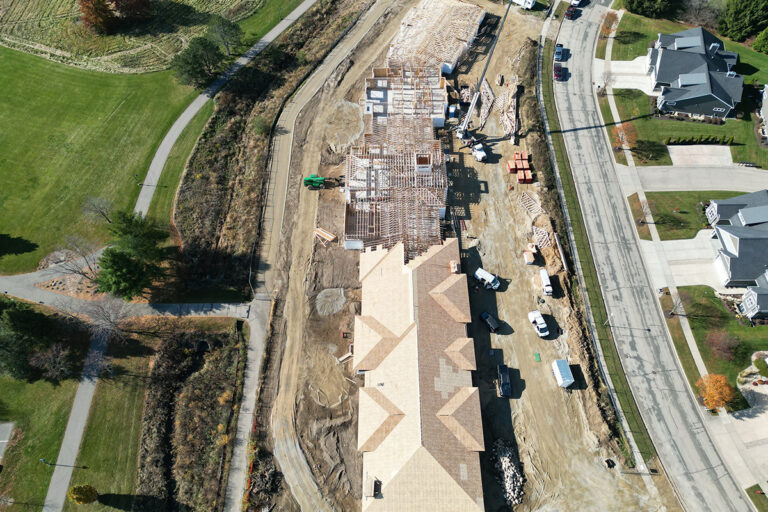 Roof being placed on the new courtyard at fitchburg memory care community