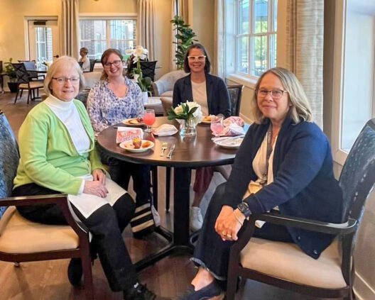 Visitors dining at the grand opening