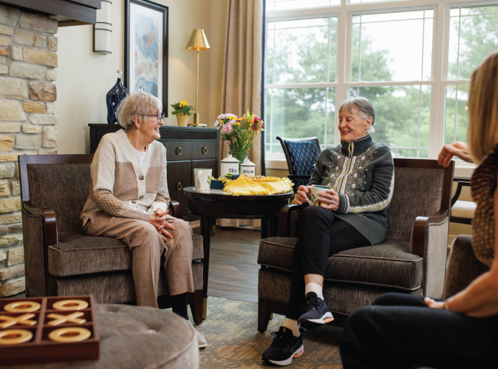 2 Women sitting together becoming friends